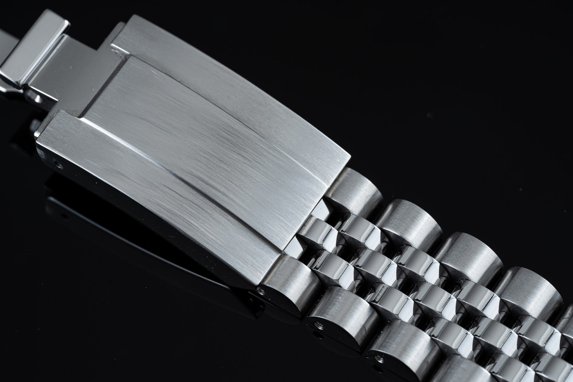 Brushed stainless steel watch bracelet with solid end links and three-link center section for Tudor Black Bay Pro