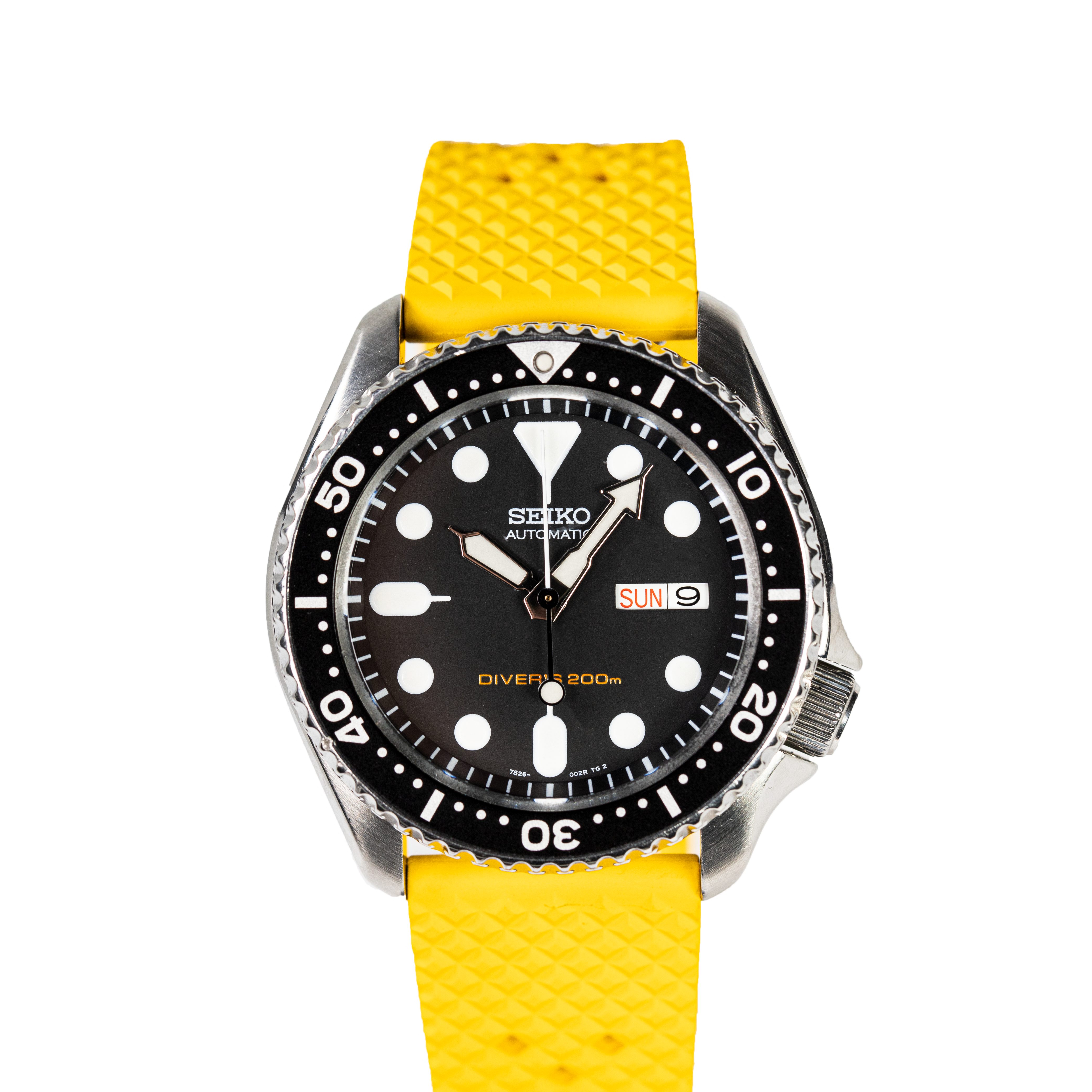 Seiko automatic diver watch with black dial and yellow quick release rubber strap