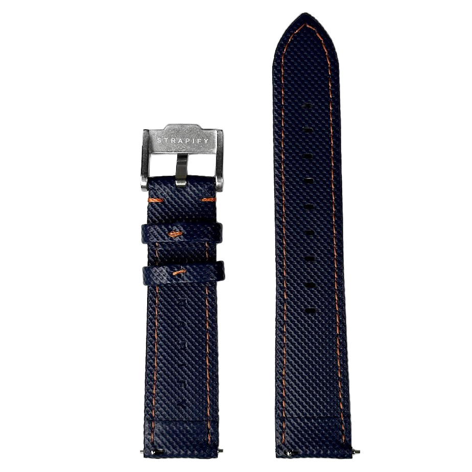 Navy blue sailcloth quick release watch strap with orange stitching and stainless steel buckle