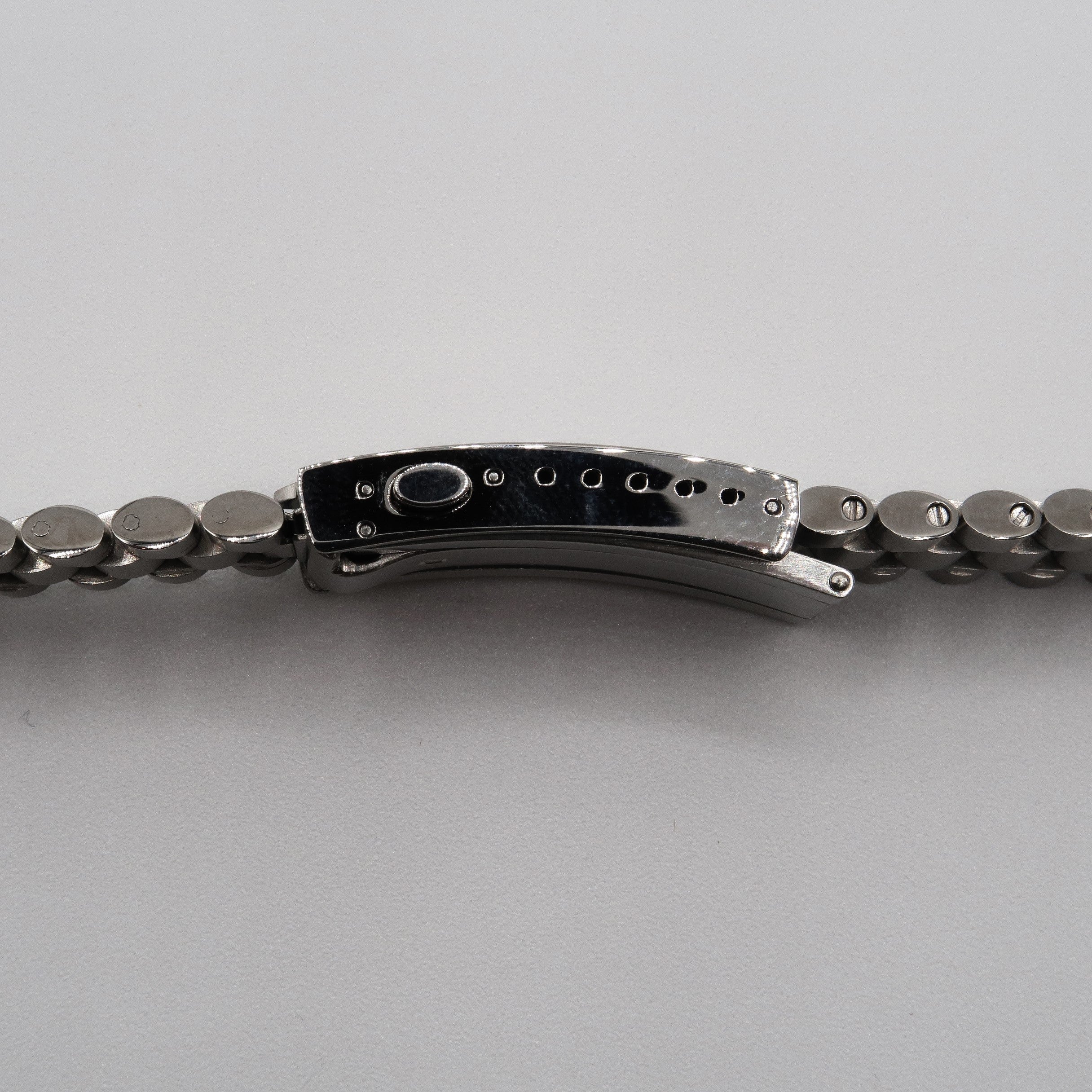 Forstner push-button milled clasp detail on the Bullet Bracelet