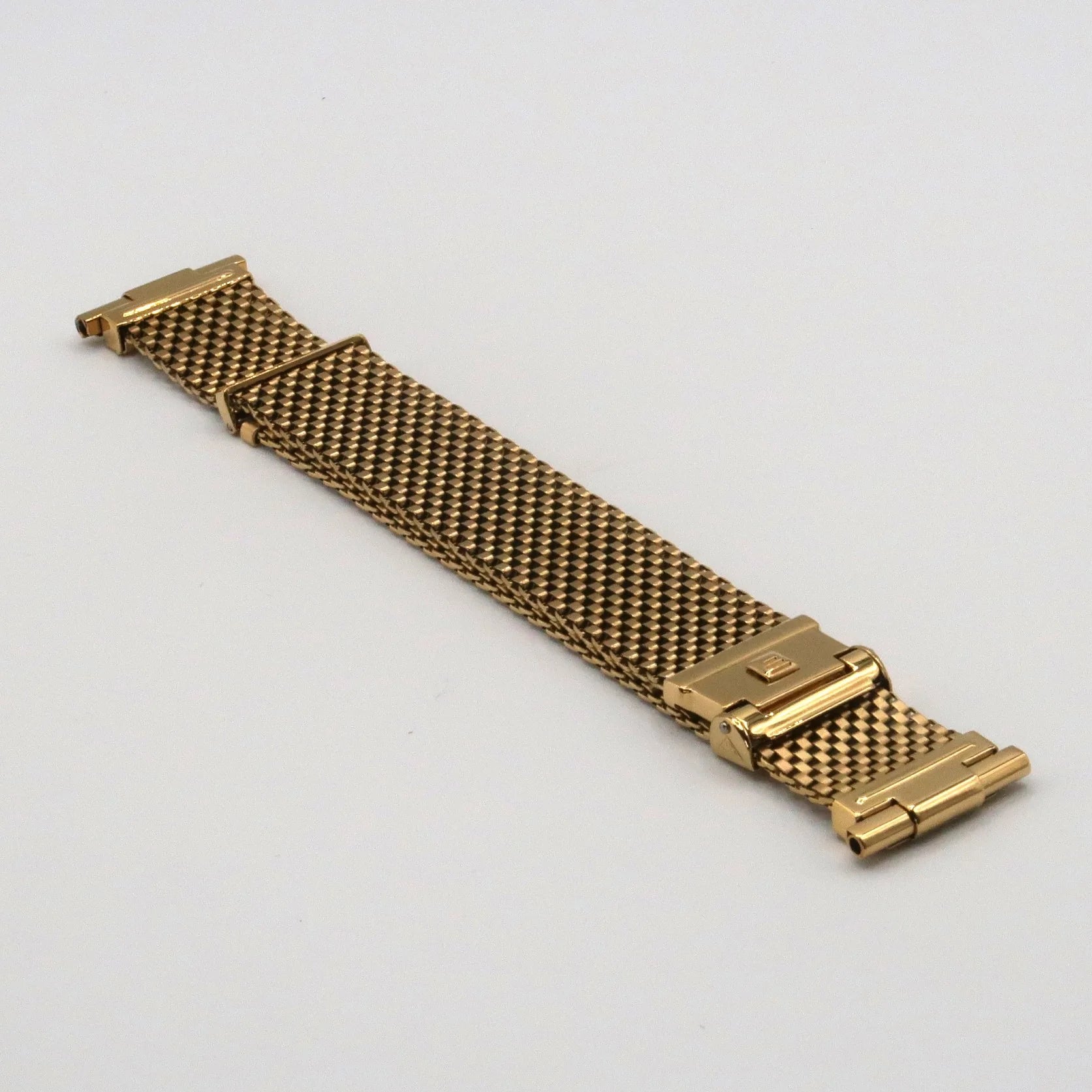Gold plated mesh watch bracelet with straight ends and fold-over clasp