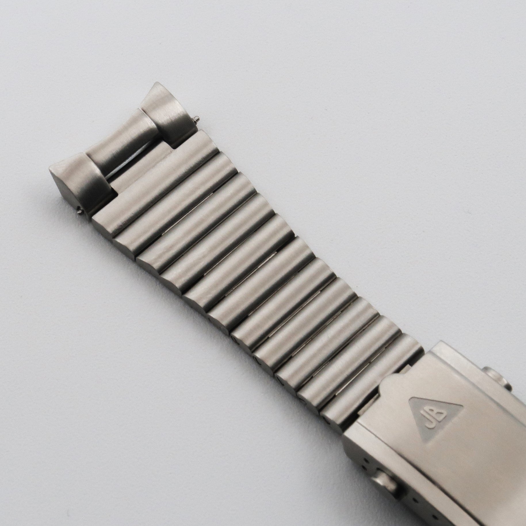 Stainless steel barrel bracelet for Tudor Black Bay Pro watch with solid links and integrated end links