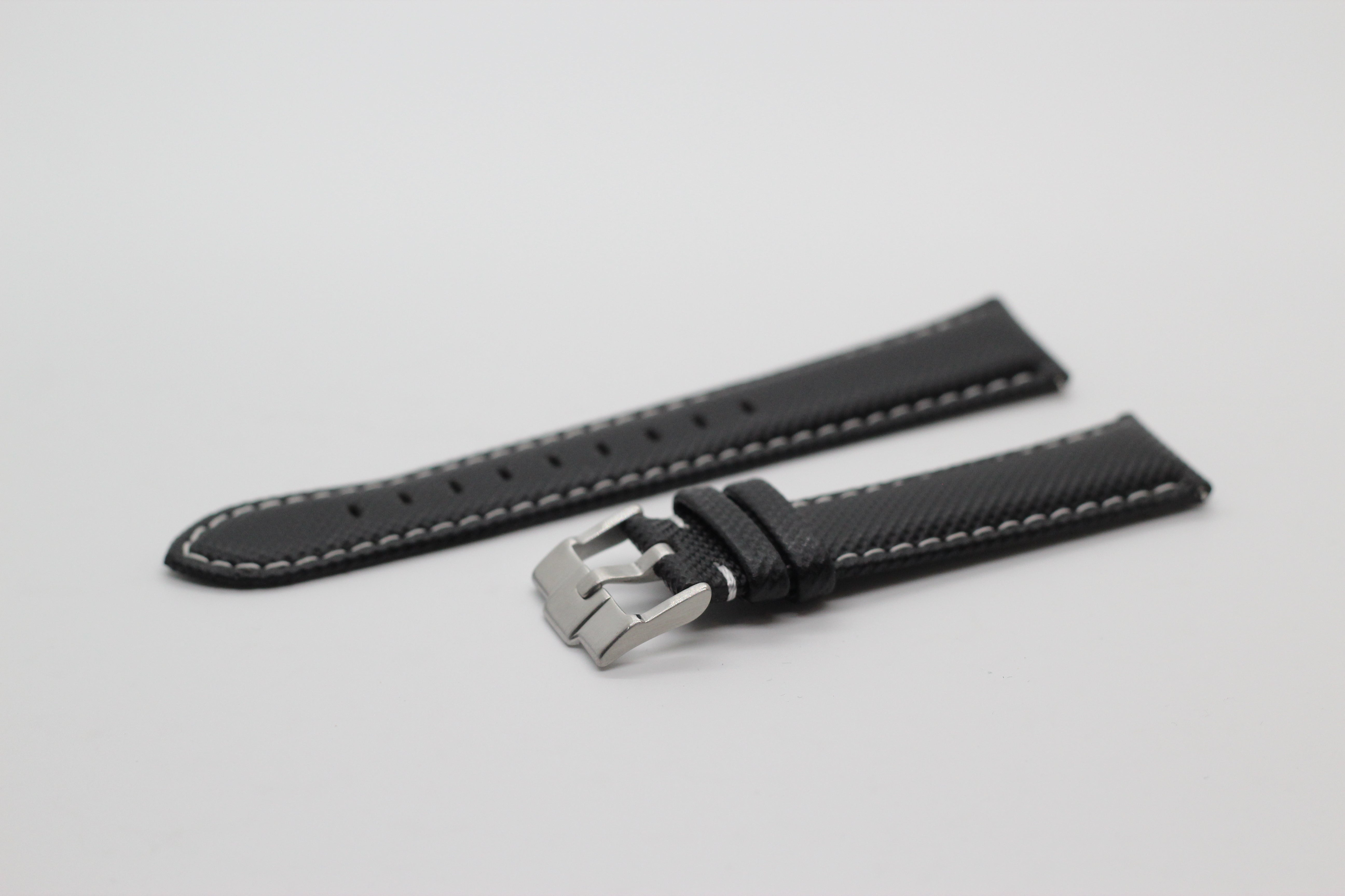 Black sailcloth quick release watch band with white contrast stitching and stainless steel buckle