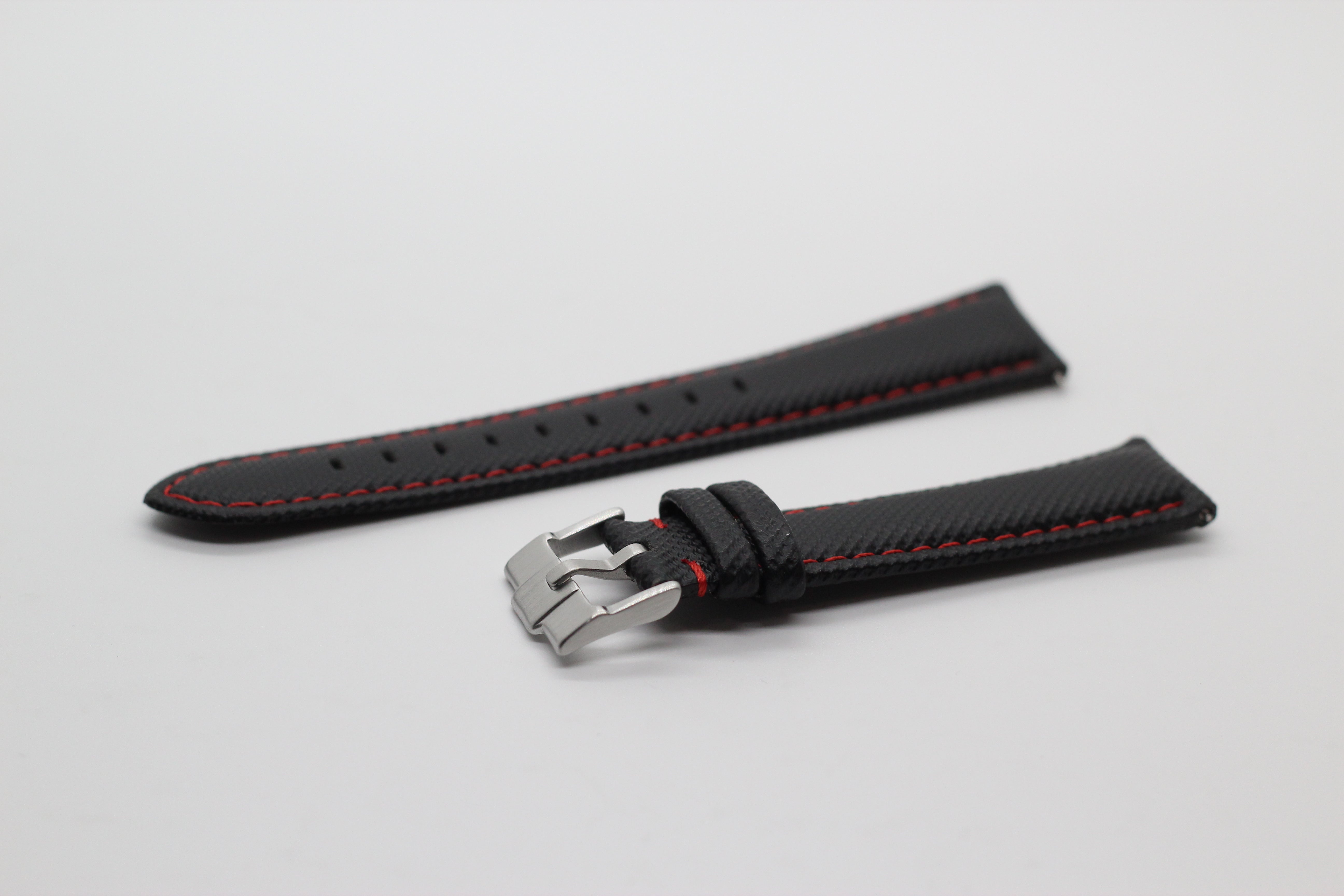 Black sailcloth quick release watch strap with red stitching and stainless steel buckle