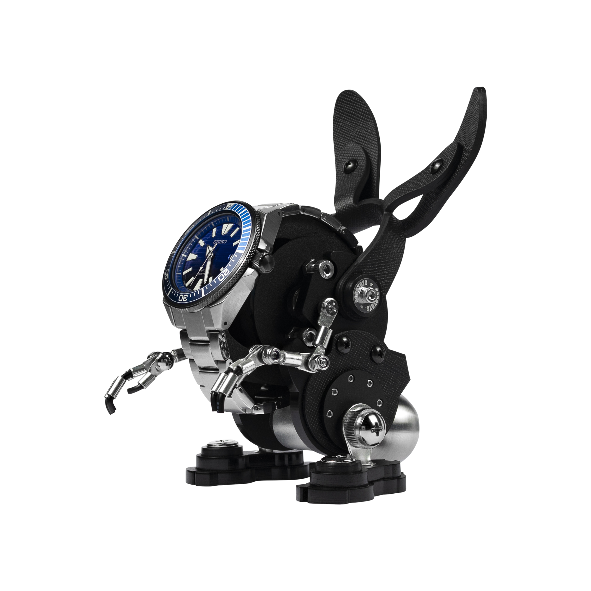 Black RoboRabbit watch stand with articulated mechanical arms holding blue dial timepiece on display base