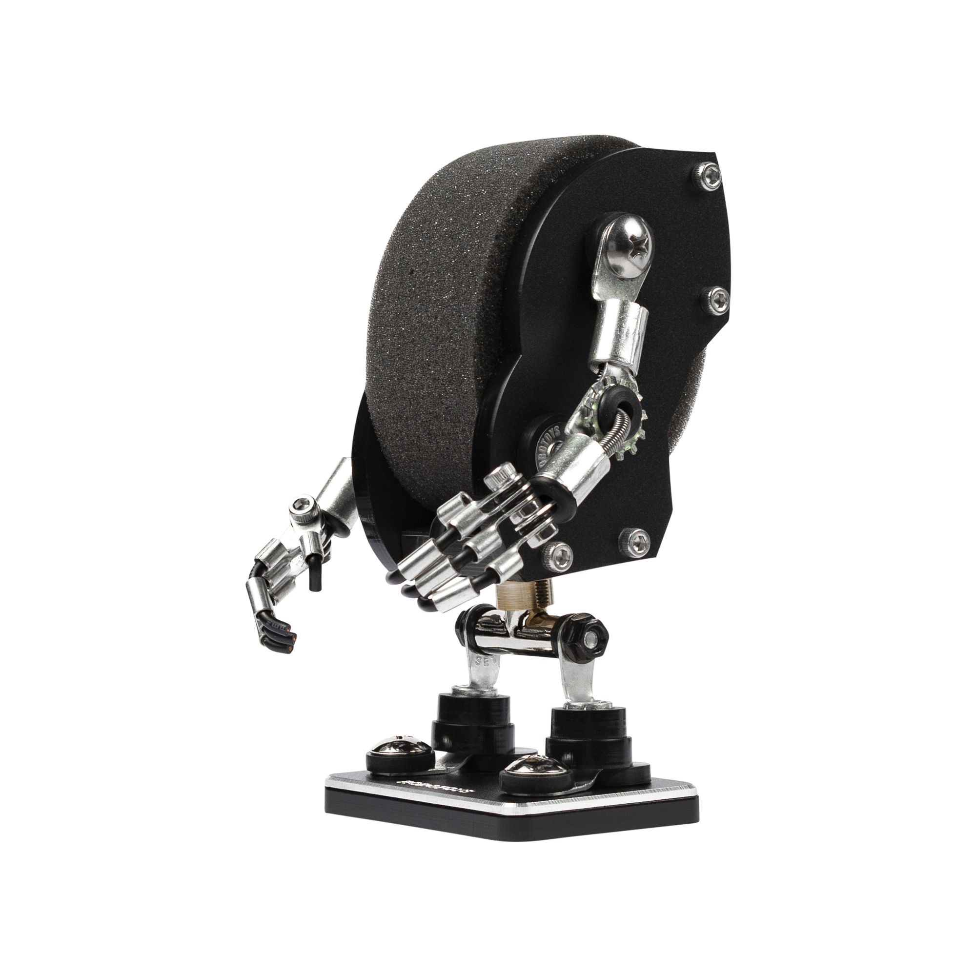 Black robot watch stand with articulated metal arms and textured dark foam head on stable base