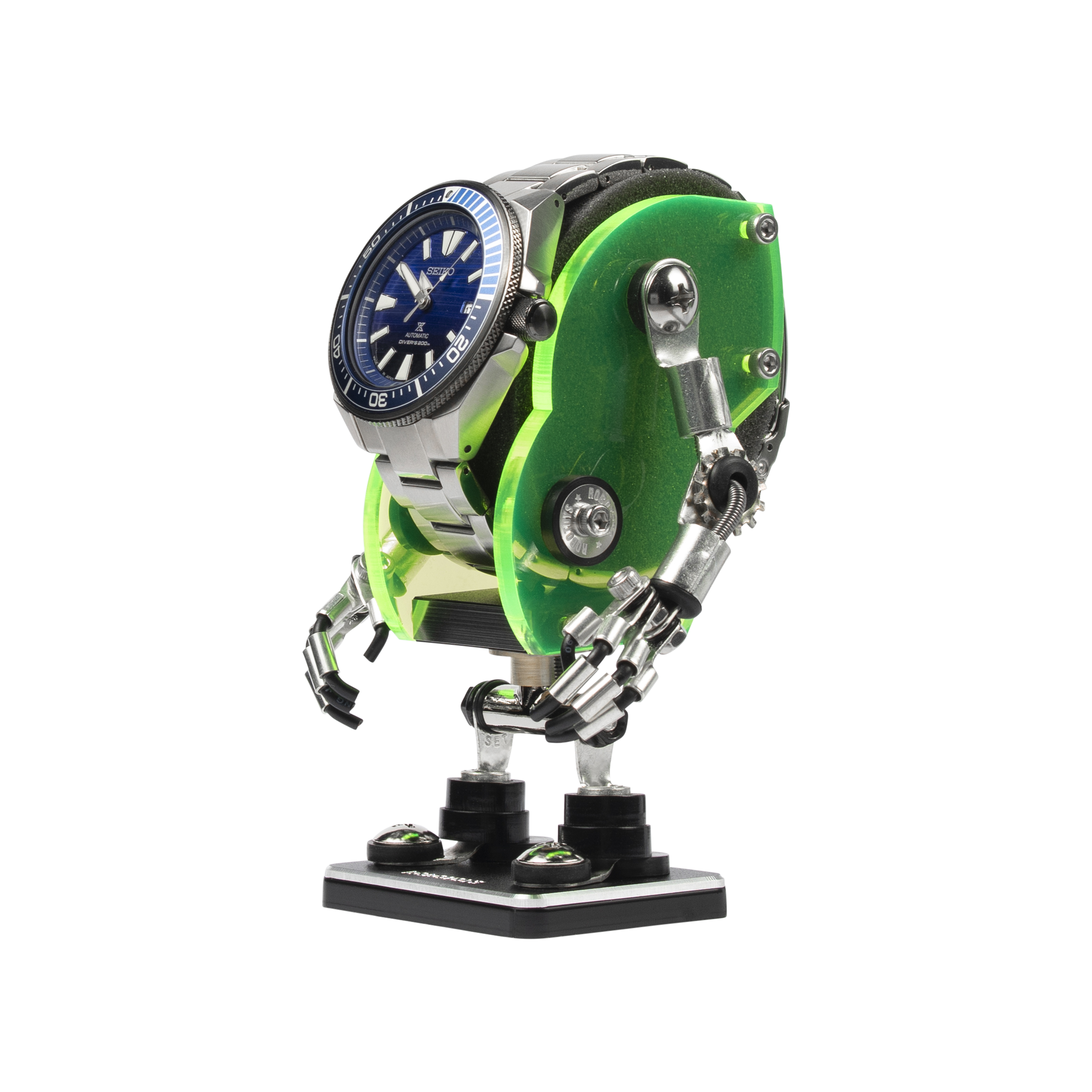 Neon green robotic watch stand with articulated metal limbs holding blue dial timepiece on black base