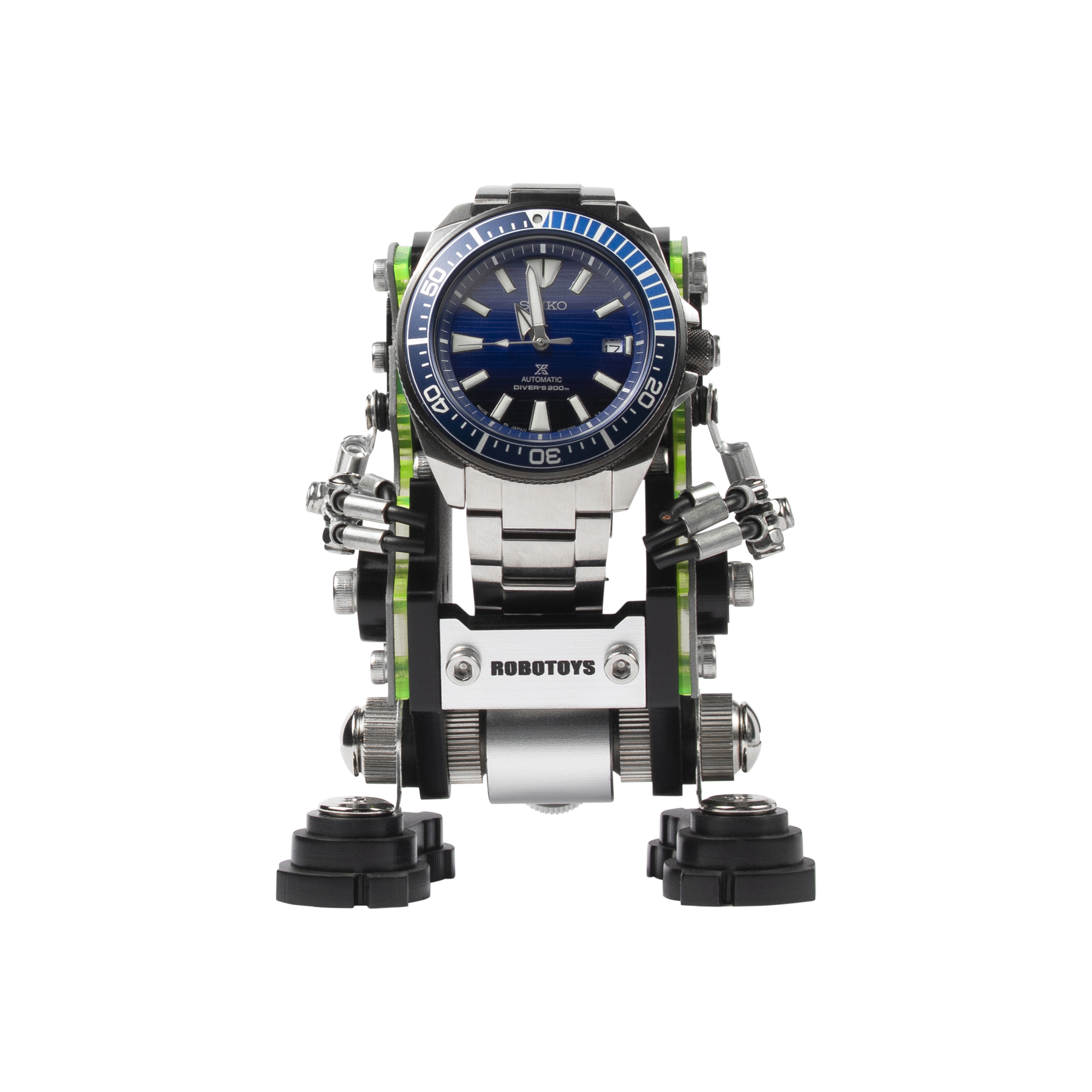 Seiko automatic dive watch mounted on green and silver RoboToys NanoBot transformer stand with articulated arms and legs