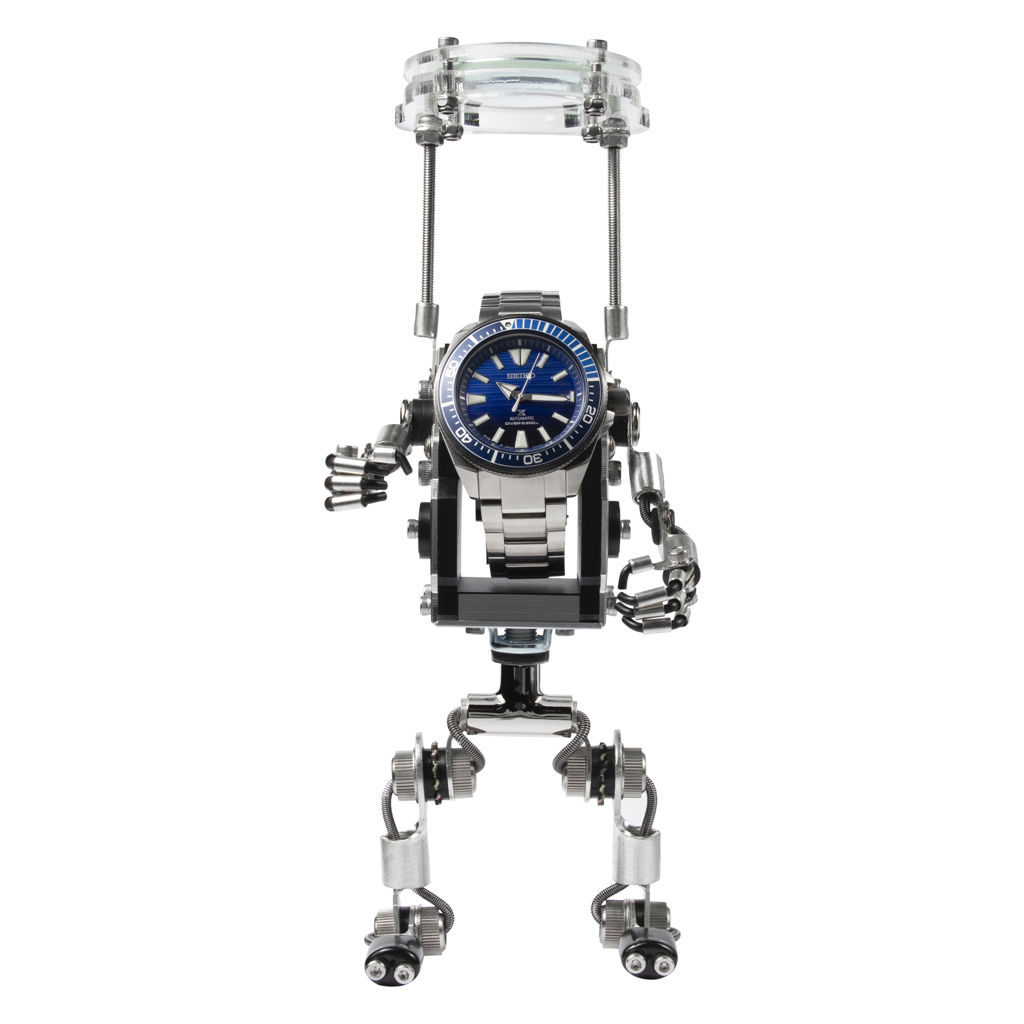 RoboMech watch stand with blue dial dive watch, articulated metal arms and legs, magnifier top, stainless steel construction