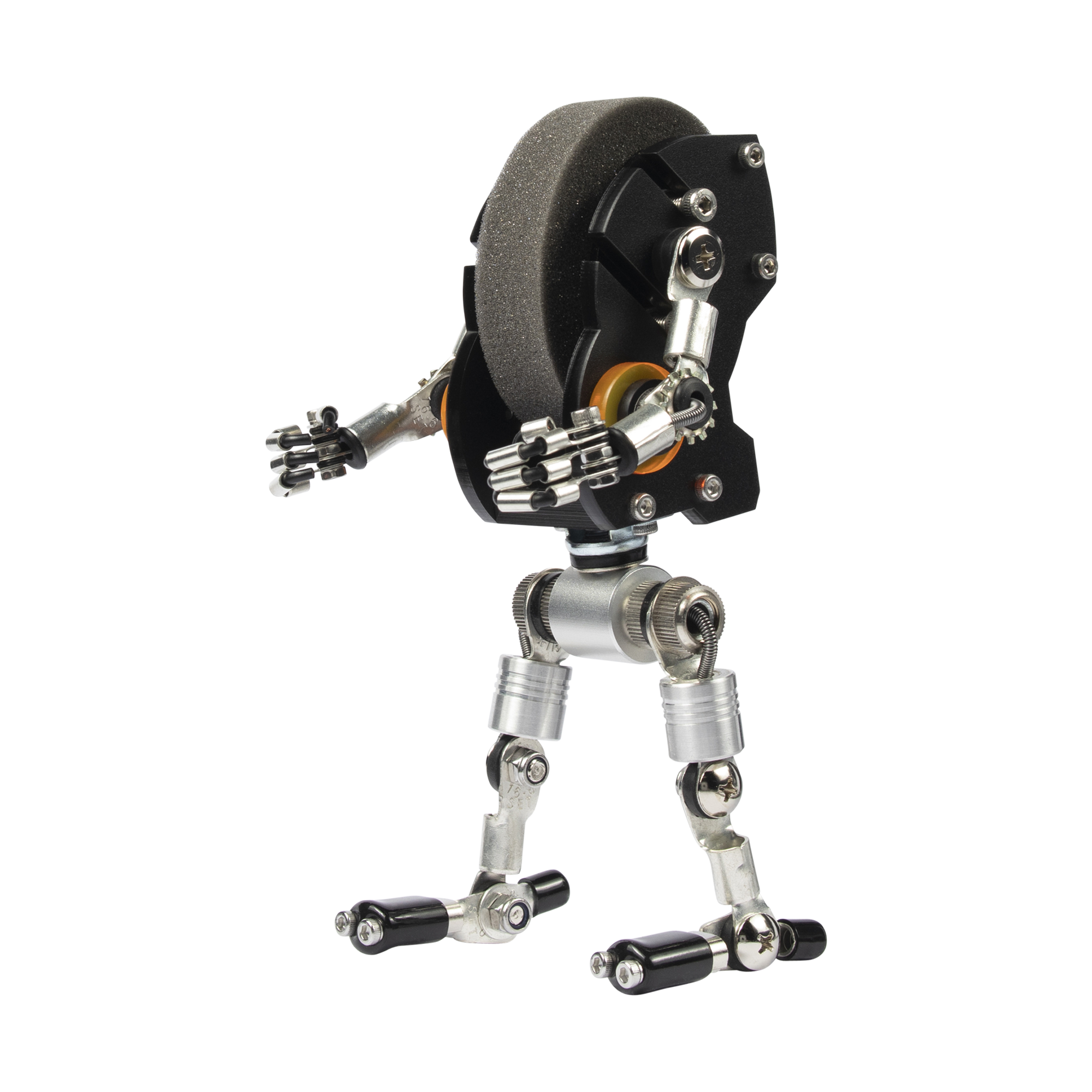 Black mechanical robot watch stand with articulated metal limbs and textured gray head piece