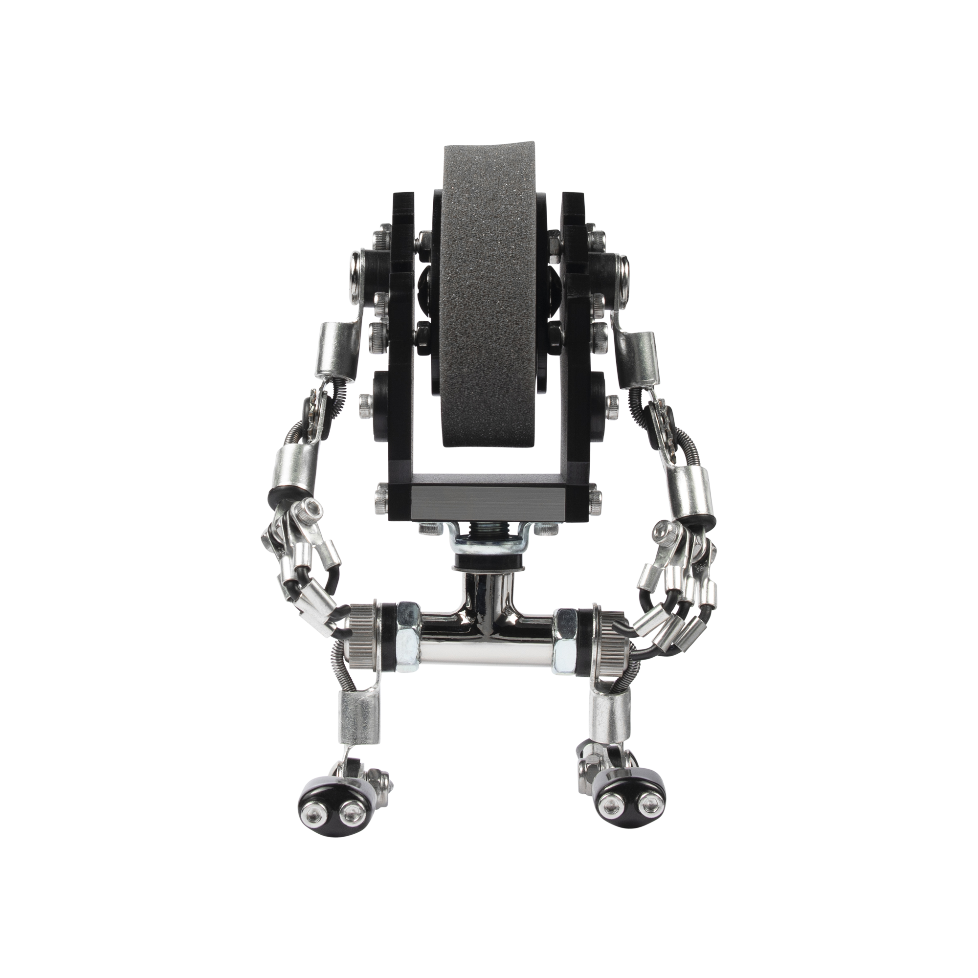 Miniature mechanical robot watch stand with black and silver metal construction, featuring articulated limbs and dual LED headlights
