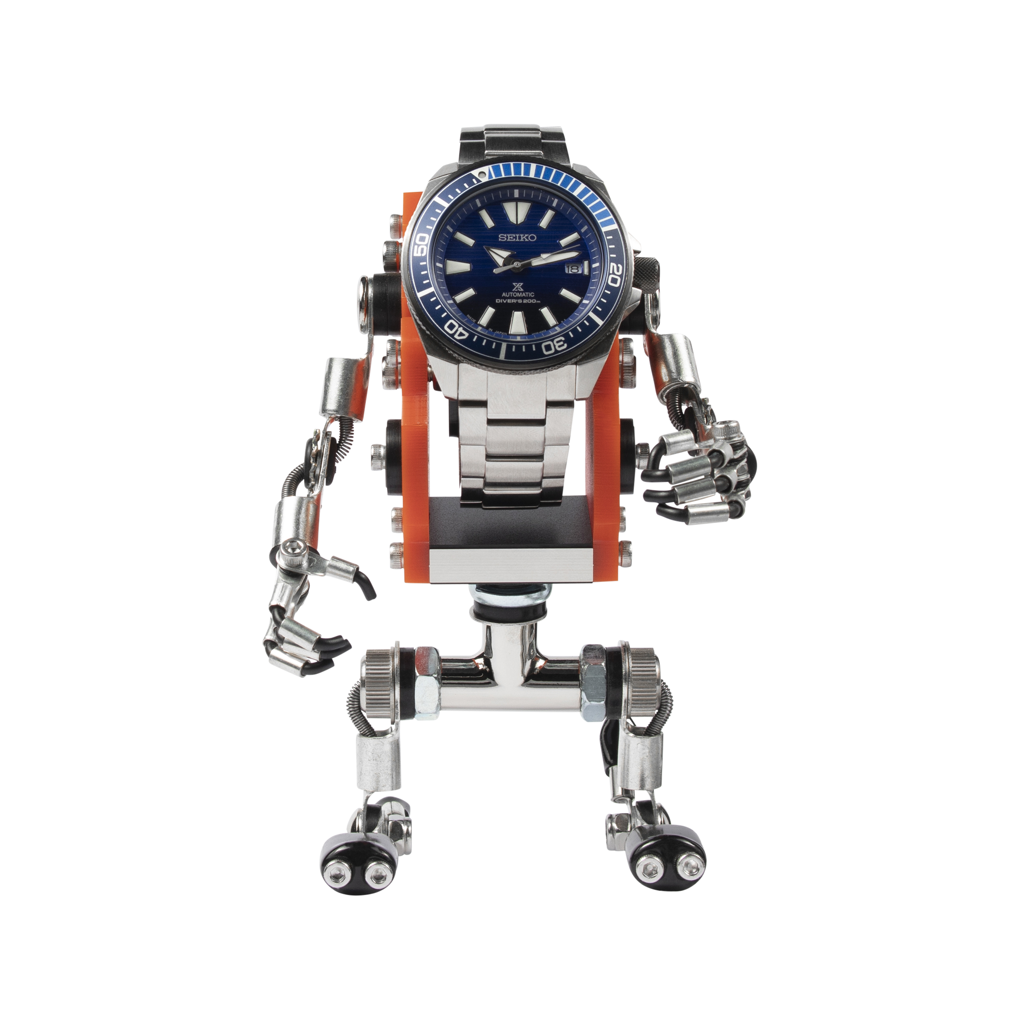 Seiko automatic dive watch mounted on orange and silver mechanical robot stand with articulated limbs and wheels