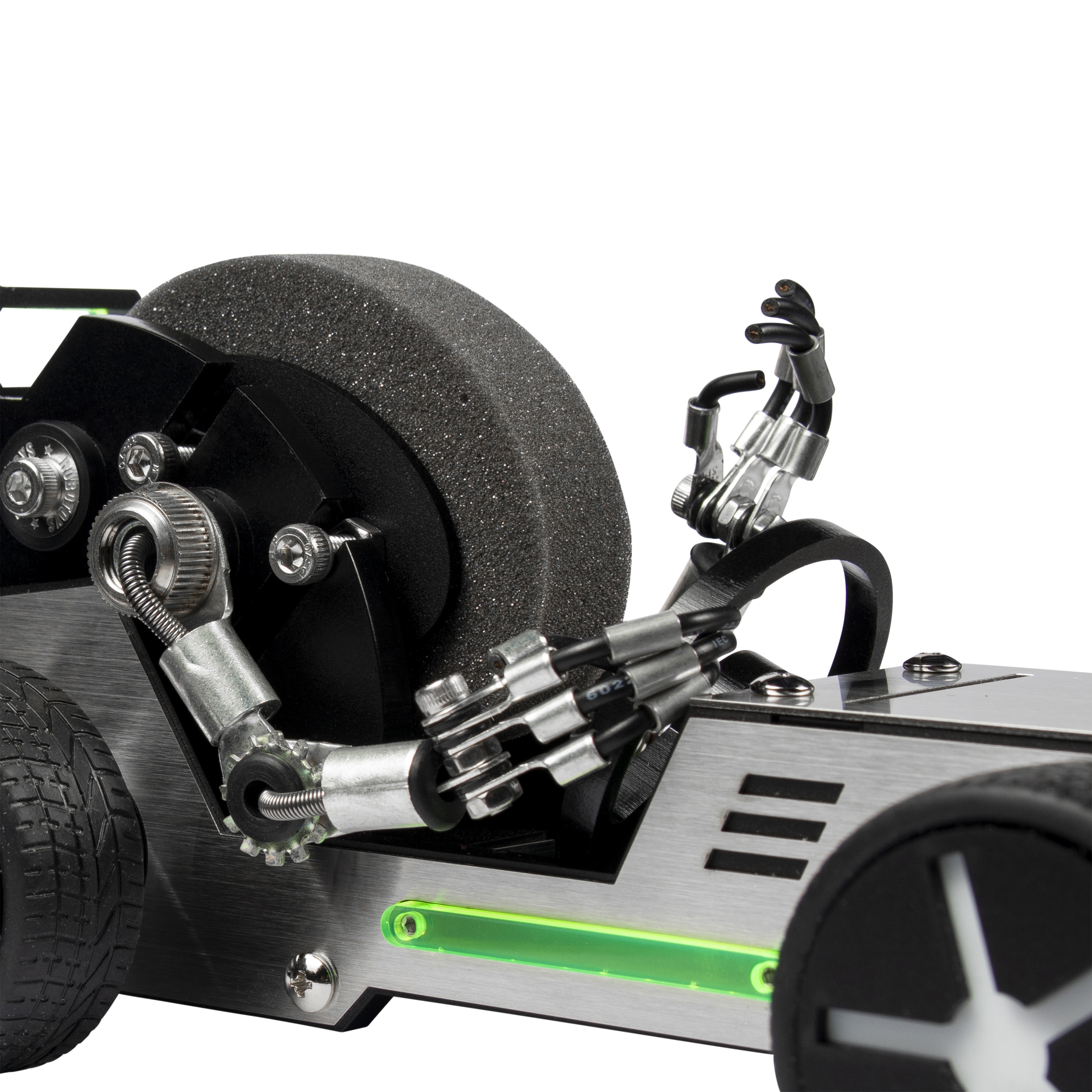 Metallic robotic hand holding smartwatch on futuristic racing car stand with textured wheel and neon green accents