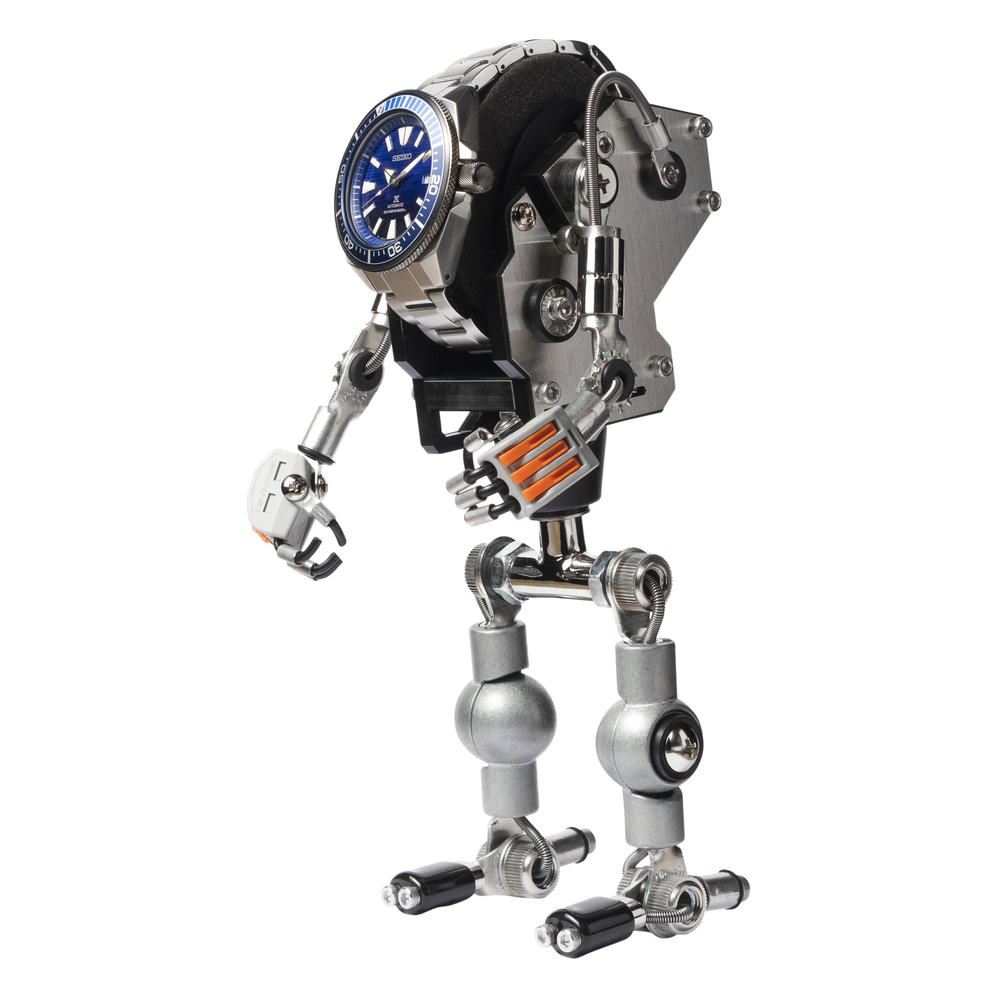 Silver robotic watch stand with blue-faced dive watch, articulated metal arms and legs, mechanical details, industrial design