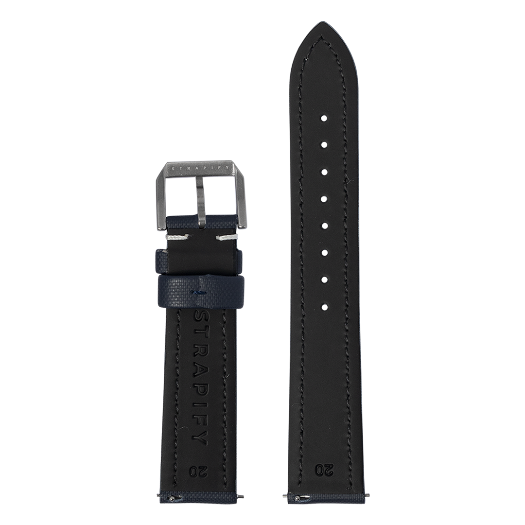 Black leather watch strap with navy sailcloth accent, silver buckle, and quick release pins