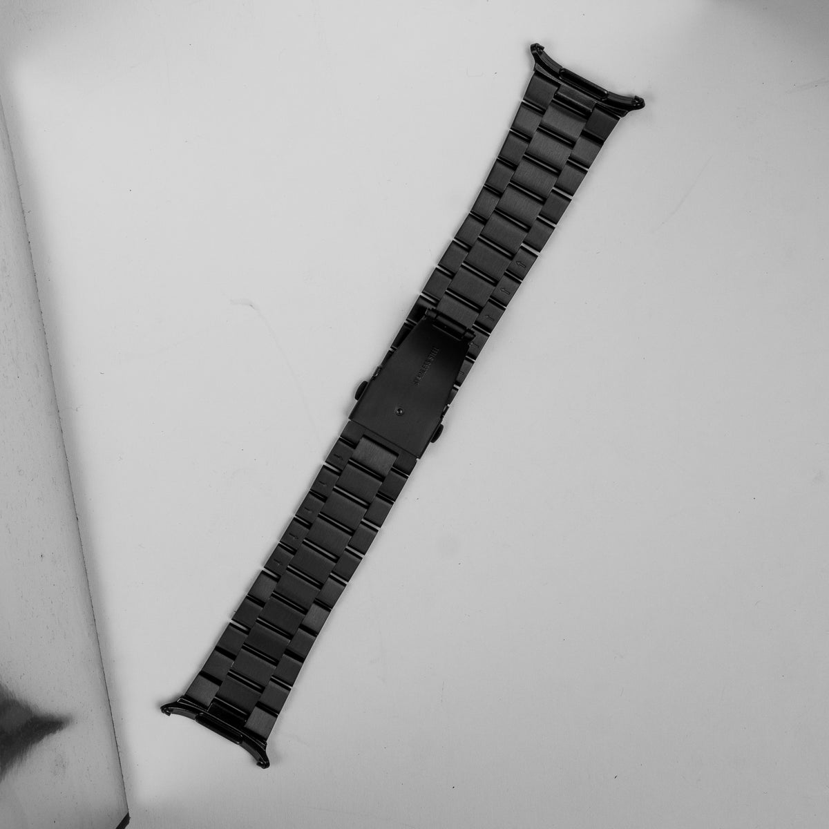 Black stainless steel bracelet band for Galaxy Watch Ultra with link design and compatible connector ends