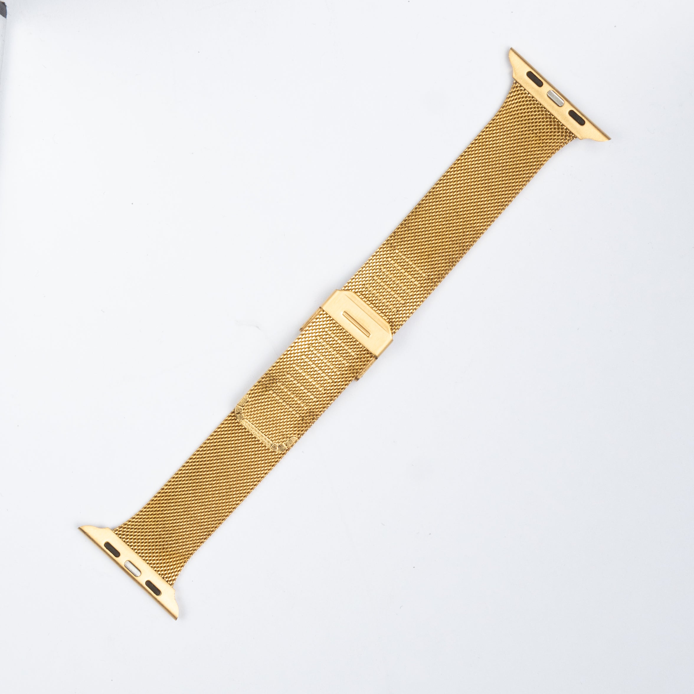 Gold Milanese mesh smartwatch band with magnetic clasp and connector lugs for Apple Watch