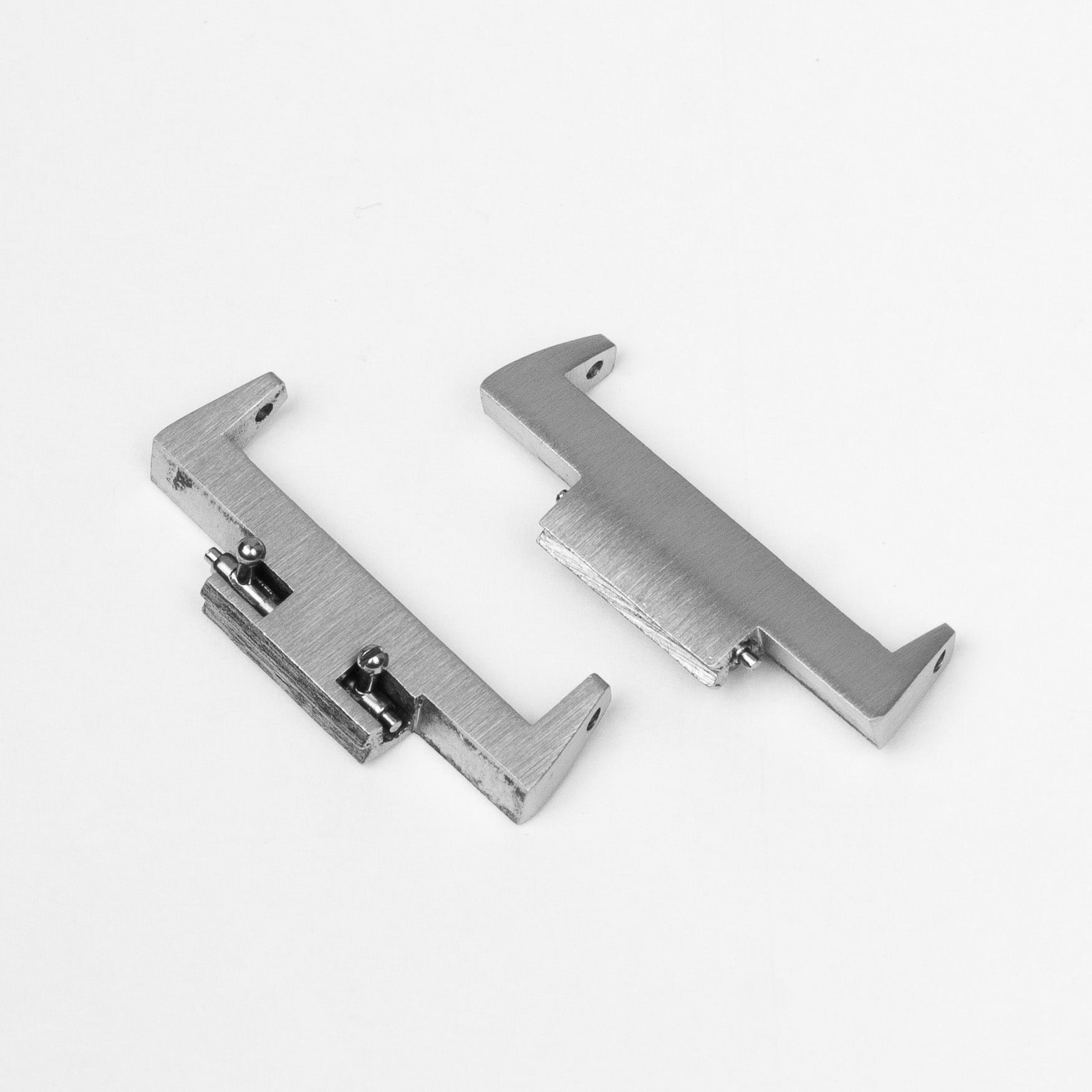 Tissot PRX 40 stainless steel strap adapter pair with mounting hardware for watch band replacement