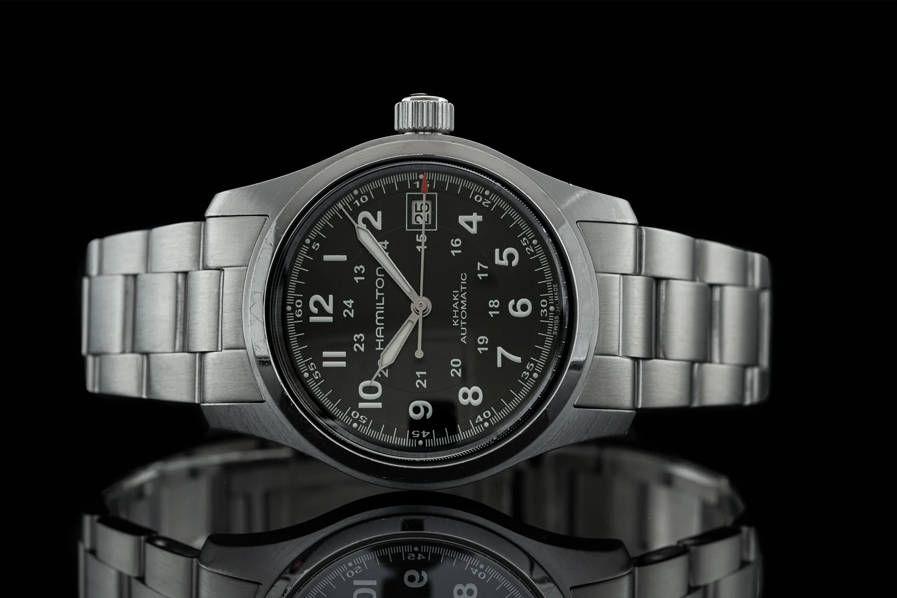 Hamilton Khaki automatic field watch with black dial, stainless steel bracelet and case, displaying numbered hour markers