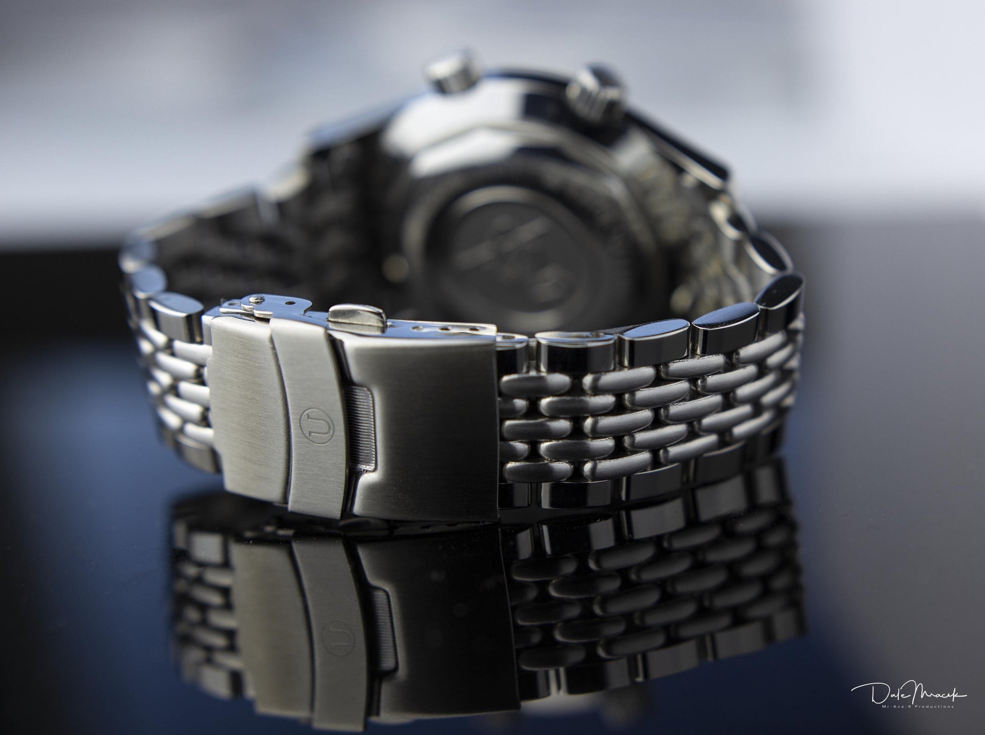 Stainless steel beads of rice bracelet with push-button clasp for Longines Legend dive watch, close-up detail shot