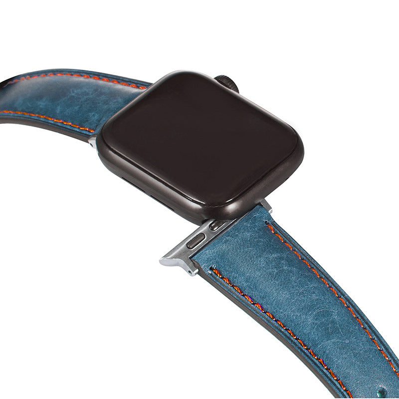 Apple Watch with modern Italian leather band in blue with orange stitching and black case