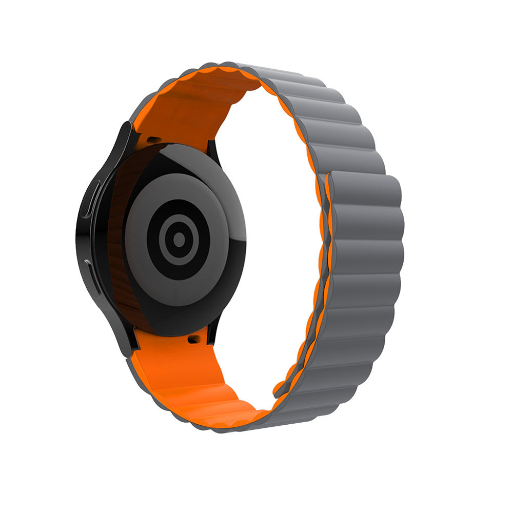 Black smartwatch with gray and orange magnetic silicone band gapless design, adjustable wristband strap