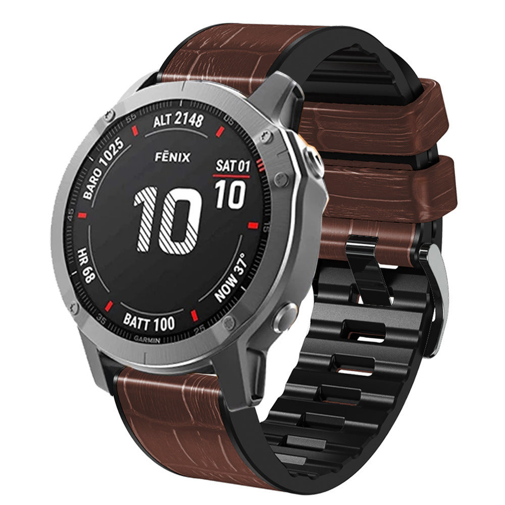 Fenix smartwatch with silver case, black dial, and brown alligator leather hybrid strap with quick-fit band system