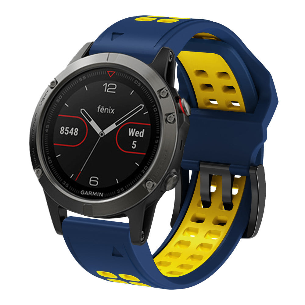 Garmin Fenix 5 smartwatch with navy blue and yellow silicone sports band showing black dial face with red accents
