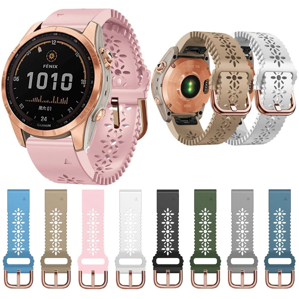 Garmin Fenix 7S smartwatch with rose gold case and pink floral silicone band, shown with eight interchangeable QuickFit 20mm bands in multiple colors