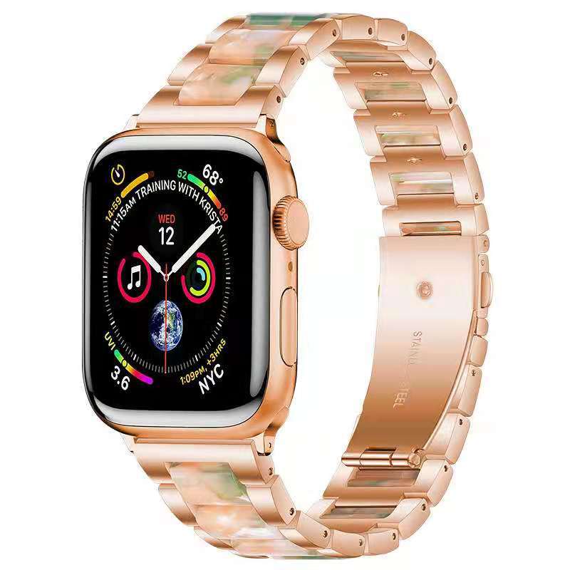 Rose gold stainless steel smartwatch with pearlescent resin band and fitness tracking display