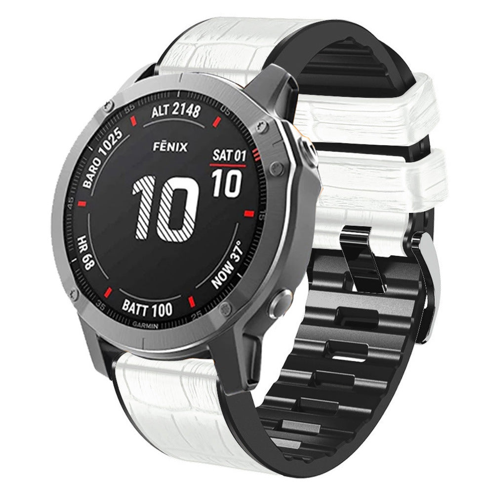 Garmin Fenix smartwatch with white alligator leather hybrid strap and black digital display showing date and battery status