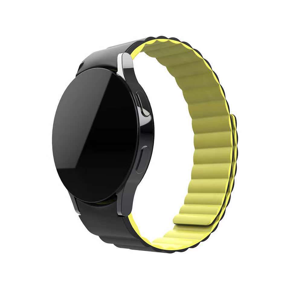 Black smartwatch with magnetic yellow silicone link band replacement strap for Galaxy Watch 4-7 and Vivomove HR