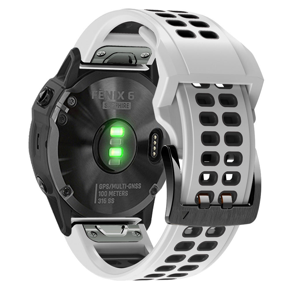 Garmin Fenix 6 Sapphire smartwatch with white QuickFit sports silicone band and GPS, showing green LED indicator on black case back