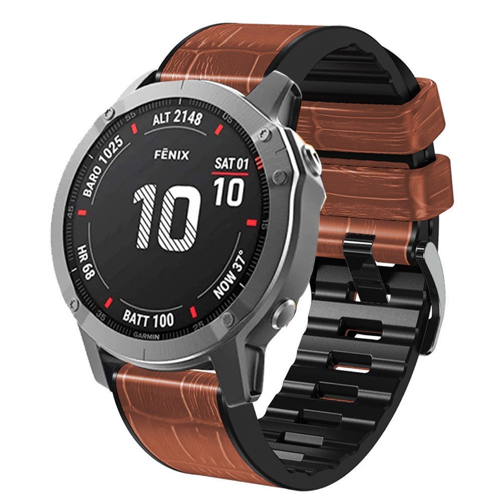 Garmin Fenix 6X smartwatch with brown alligator leather hybrid band and black sport strap showing digital display