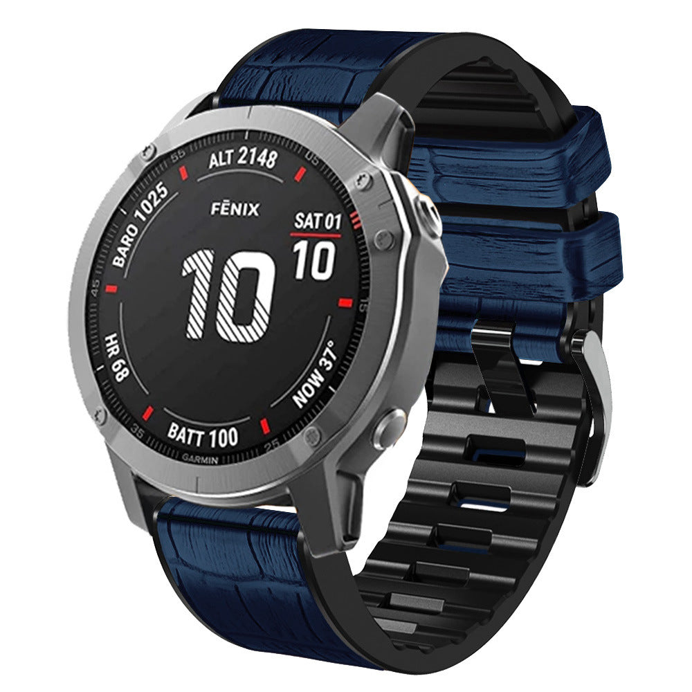 Garmin Fenix smartwatch with silver case, black dial, blue alligator leather hybrid band and black rubber strap