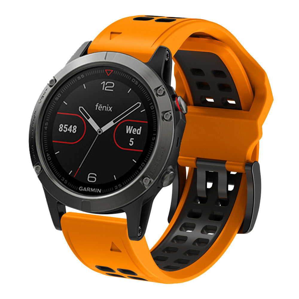 Garmin Fenix 5S smartwatch with orange silicone sports band and black dial displaying time and date