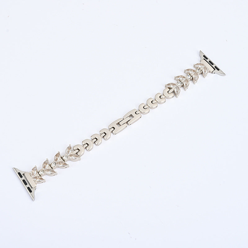 Silver crystal leaf Apple Watch band with adjustable metal links and connector ports