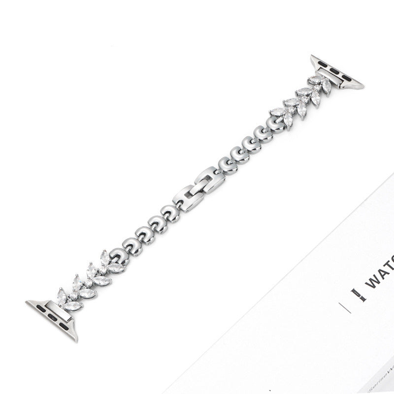Silver crystal Apple Watch band with marquise-cut cubic zirconia stones and stainless steel chain links