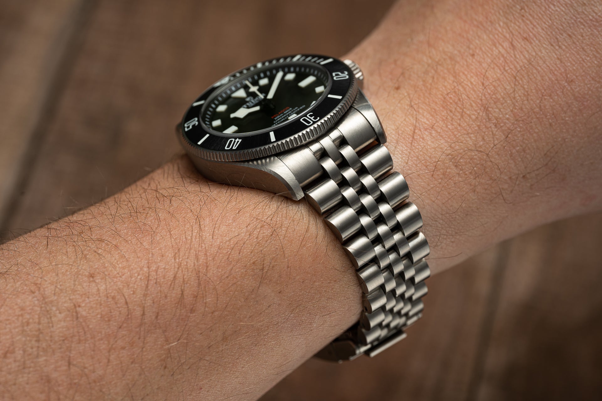 Titanium Executive Bracelet for Tudor Pelagos 39mm watch with polished three-link band on wrist
