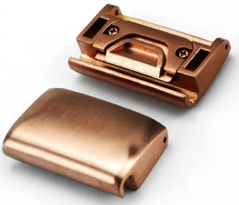 Copper spring bar adapter set with open and closed views showing quick-fit mechanism for 26mm watch straps
