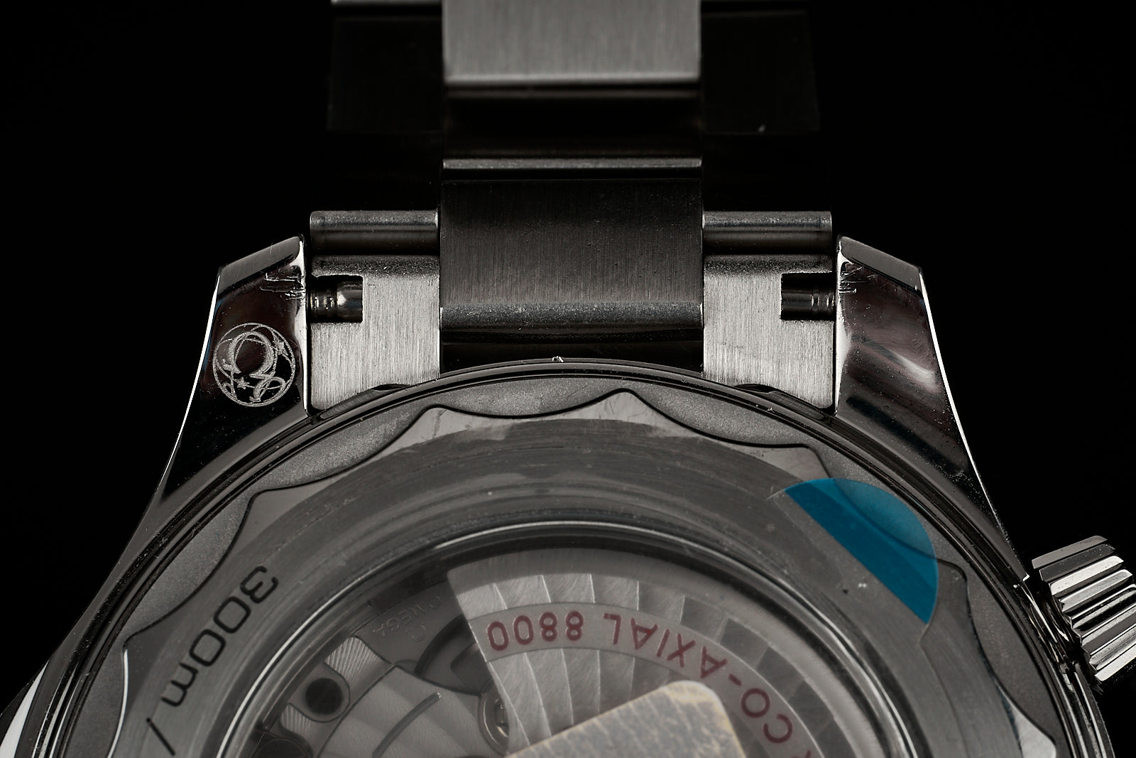Stainless steel dive watch bracelet for Omega Seamaster 300m with solid end links and secure clasp system, top view