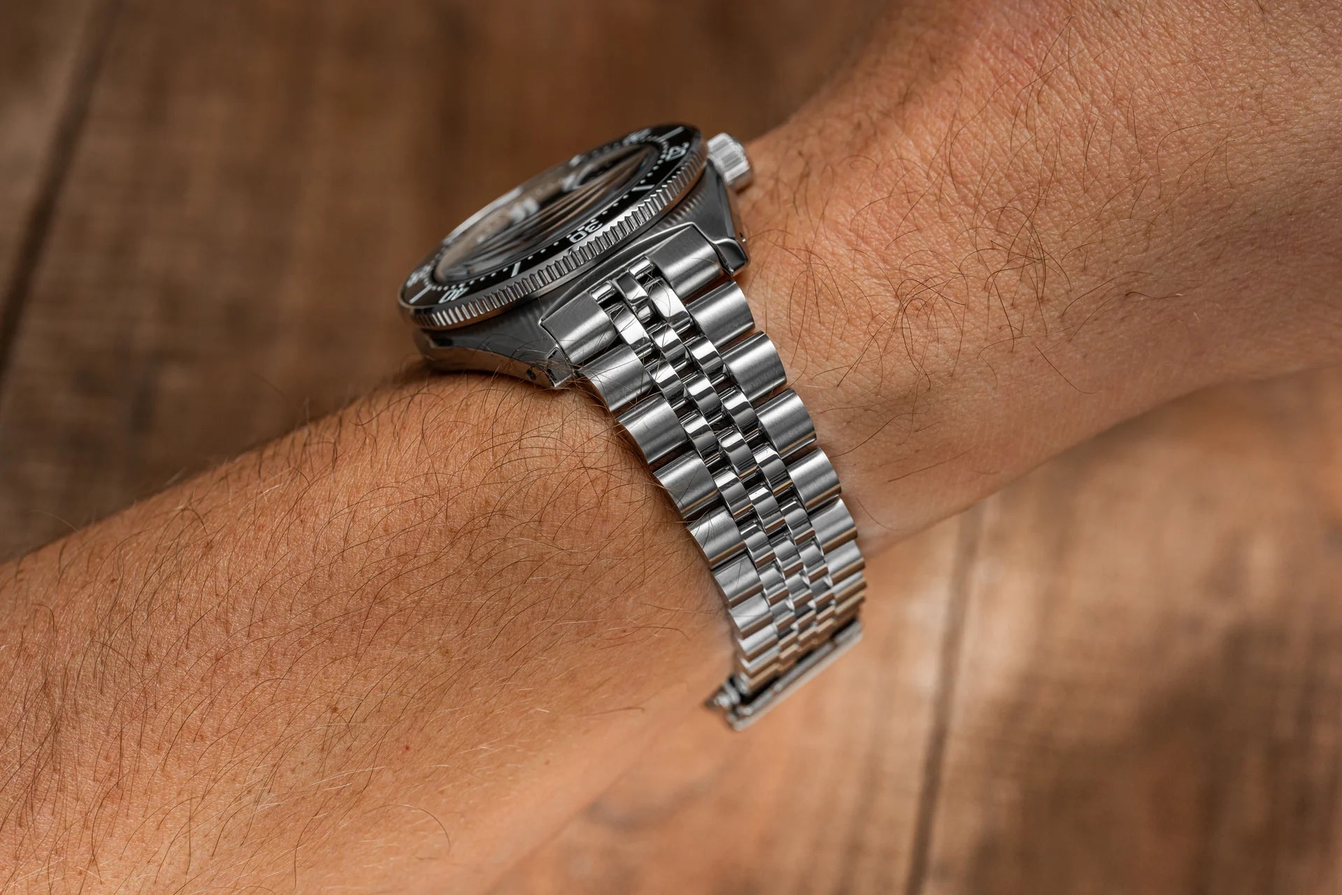 Seiko SPB45x Executive dive watch with stainless steel bracelet worn on wrist, featuring rotating bezel and professional timepiece design