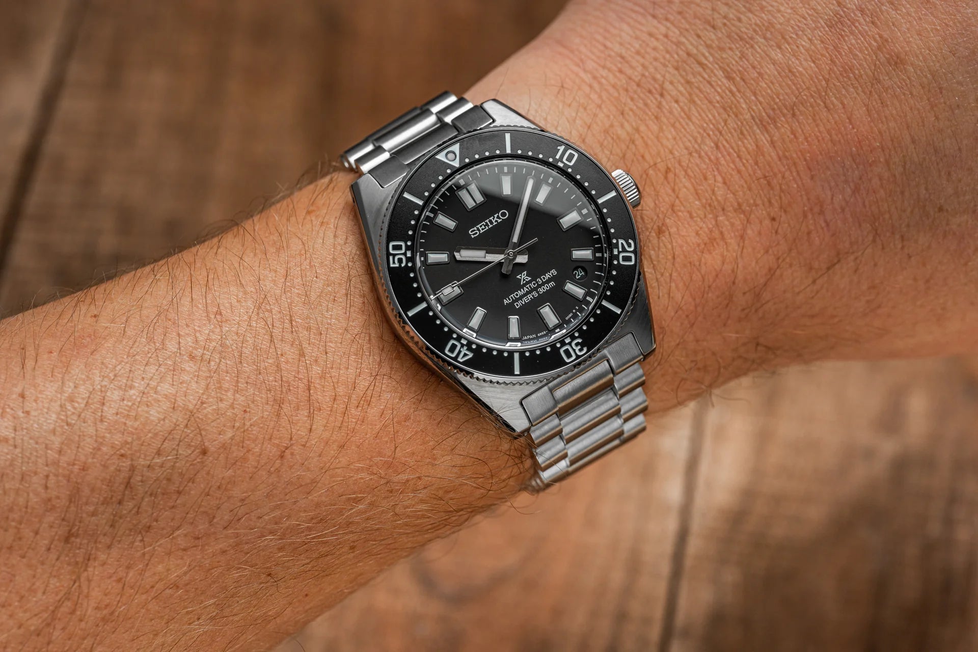 Seiko SPB45 automatic dive watch with black dial and stainless steel bracelet on wrist