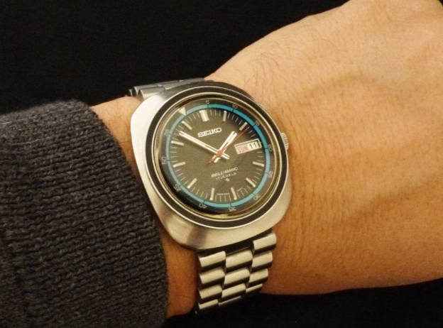 Seiko Bell-Matic 4006 automatic watch with brown dial and day-date window on stainless steel bracelet worn on wrist