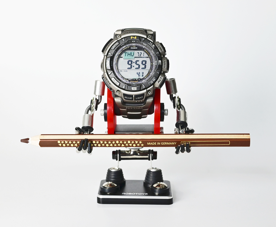 Minibot red watch stand with digital watch display and German-made ski prop, desk collectible toy