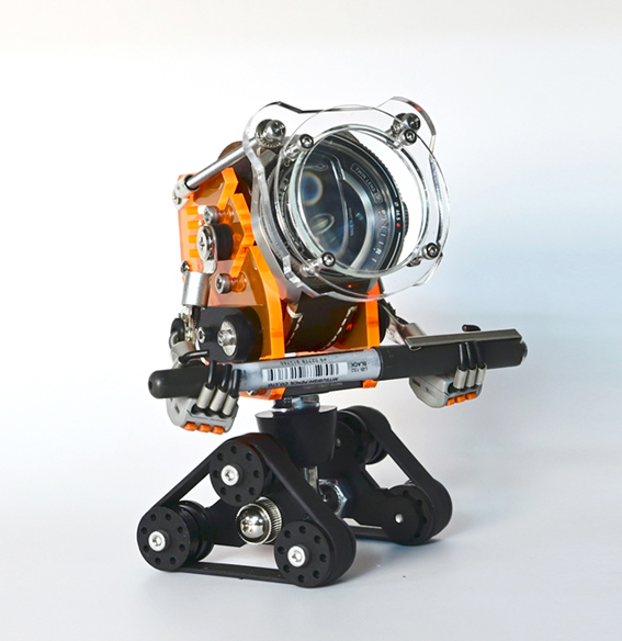 Orange RoboTank watch stand with rotating lens, black tracked base and articulated arms
