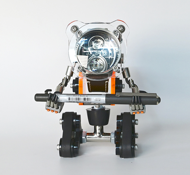 RoboTank neon orange watch stand with dual LED eyes, articulated arms, and wheeled base front view
