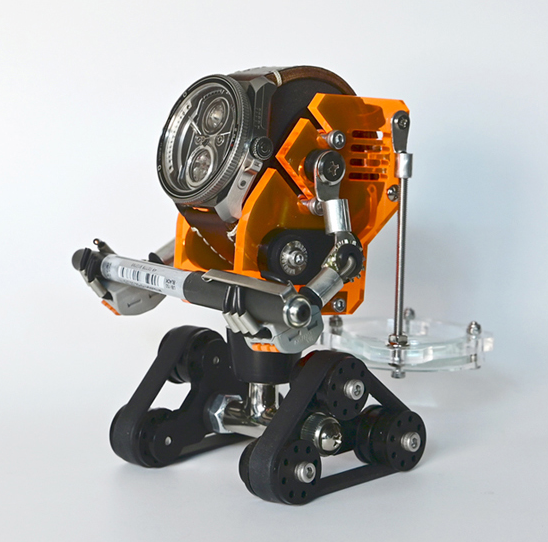 Neon orange robotic watch stand with articulated mechanical arms and black tank treads holding oversized watch display
