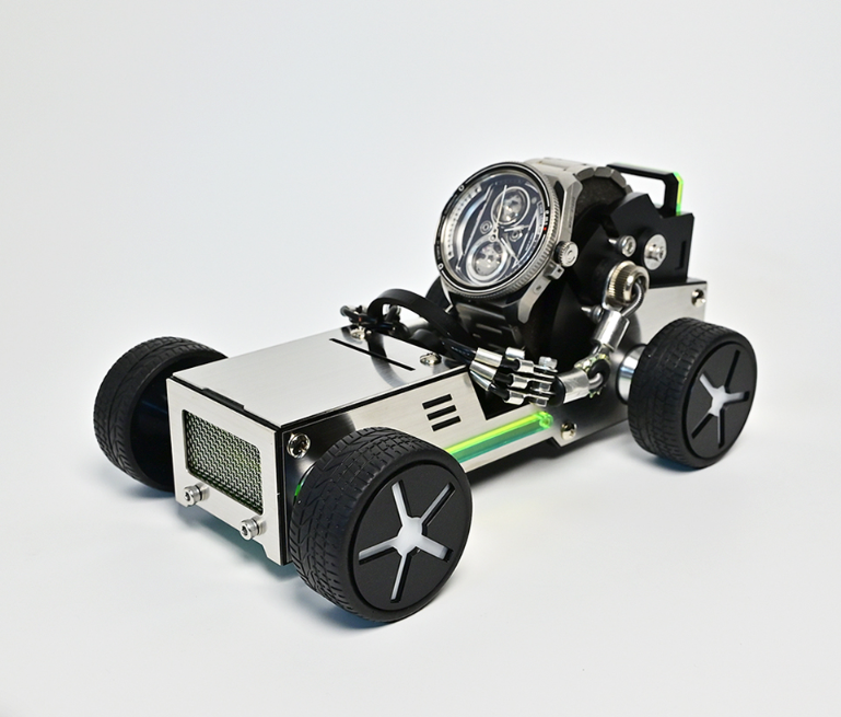 RoboToys Watch Stand Roadster with oversized black wheels and silver chassis displaying wristwatch