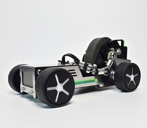 Black and green robot toy roadster with white star wheels and open cockpit design on white background
